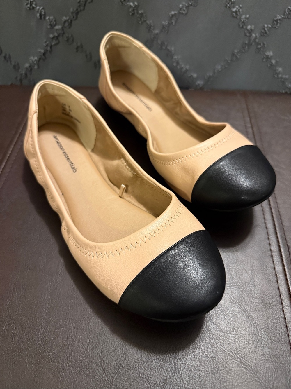 Amazon Essentials Cap-Toe Two-Tone Ballet Flats in Beige and Black